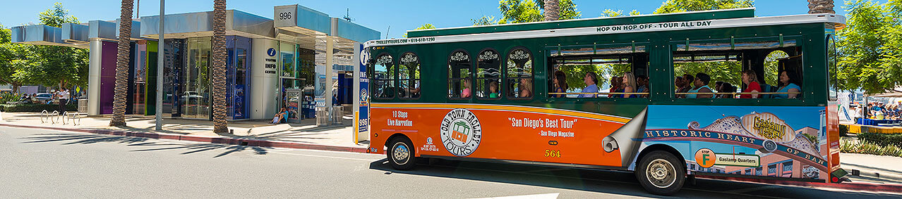 picture of san diego trolley in front of visitor info center