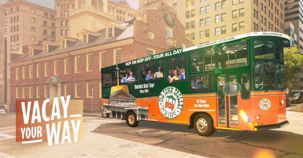 Boston Vacay Your Way and trolley driving past Old State House