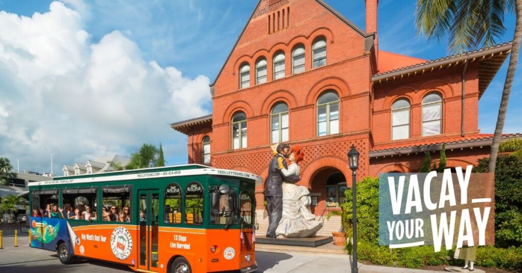 Key West Vacay Your Way and trolley driving past Custom House 