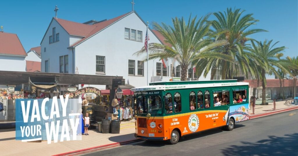 San Diego trolley driving past Old Town Market and Vacay Your Way