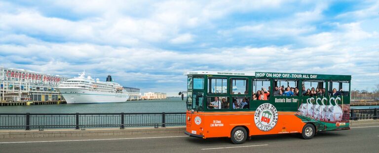 Boston trolley and cruise ship in background