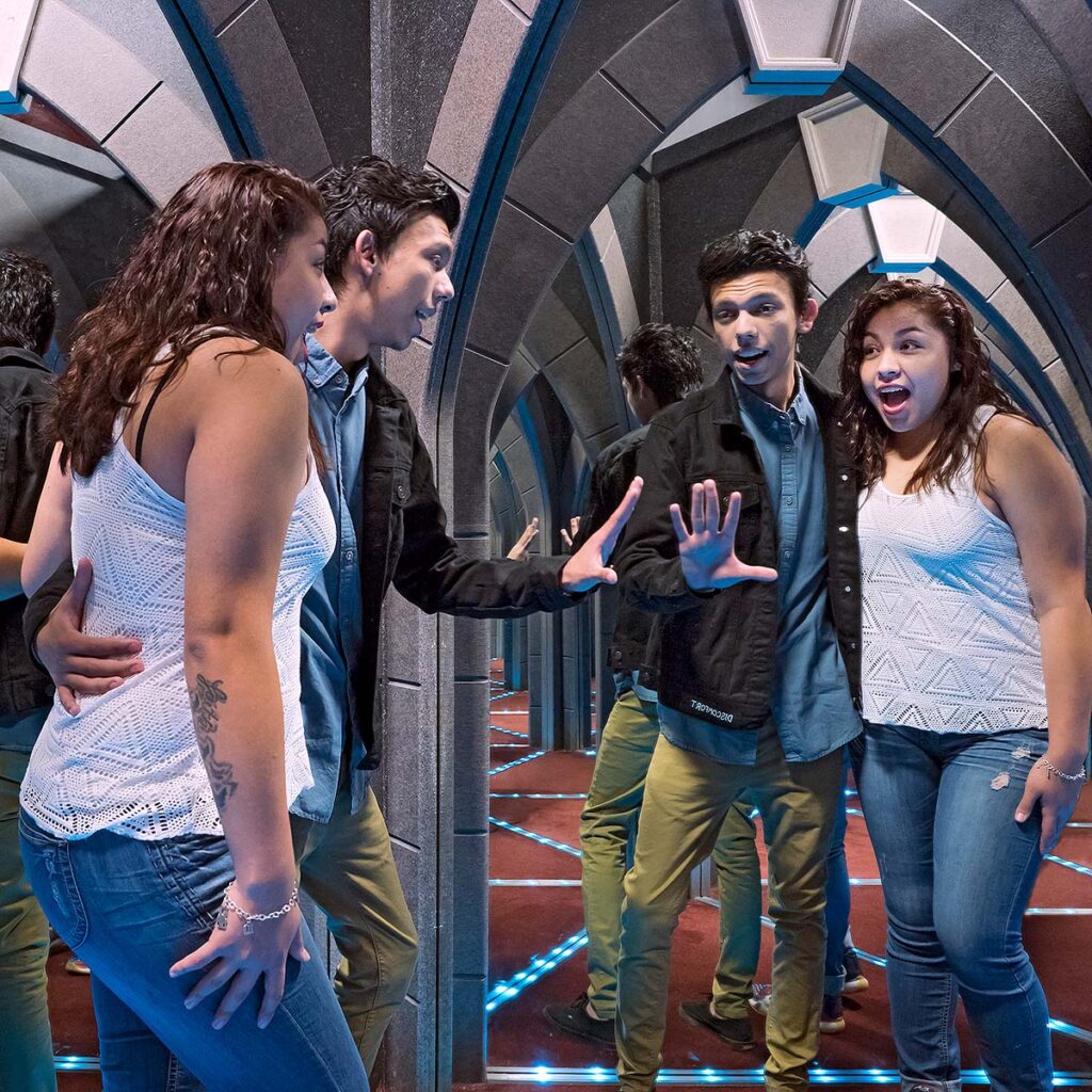 guests inside mirror maze