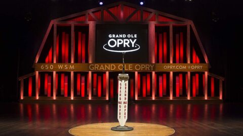 Iconic Grand Ole Opry stage in Nashville, Tennessee, showcasing classic microphone and wooden accents