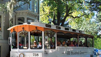 Old Savannah Tours trolley riding around Savannah