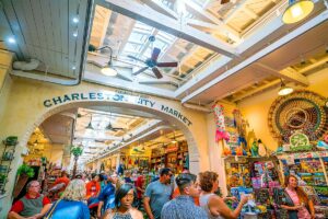 people shopping at Charleston City Market stalls 